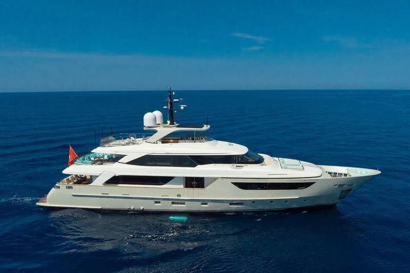 a white yacht in the ocean aboard KIA ORA Yacht for Sale