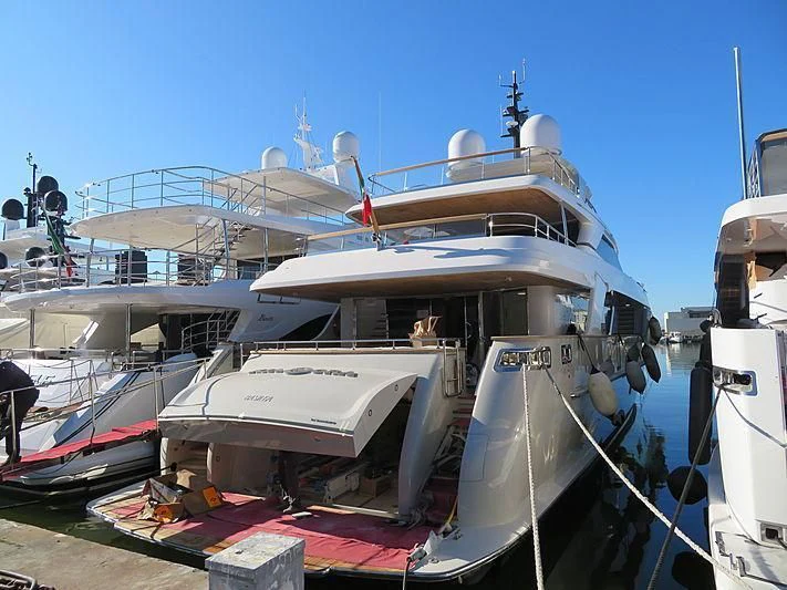 a boat docked at a pier aboard KIA ORA Yacht for Sale