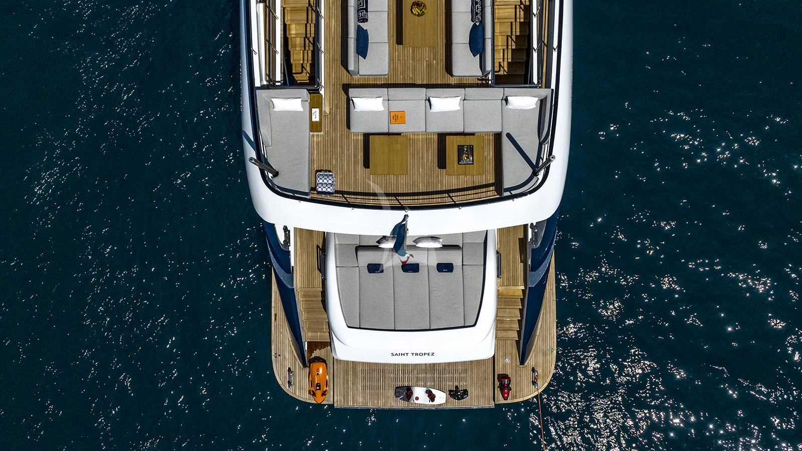 a white and yellow ship on water aboard ARSANA Yacht for Charter
