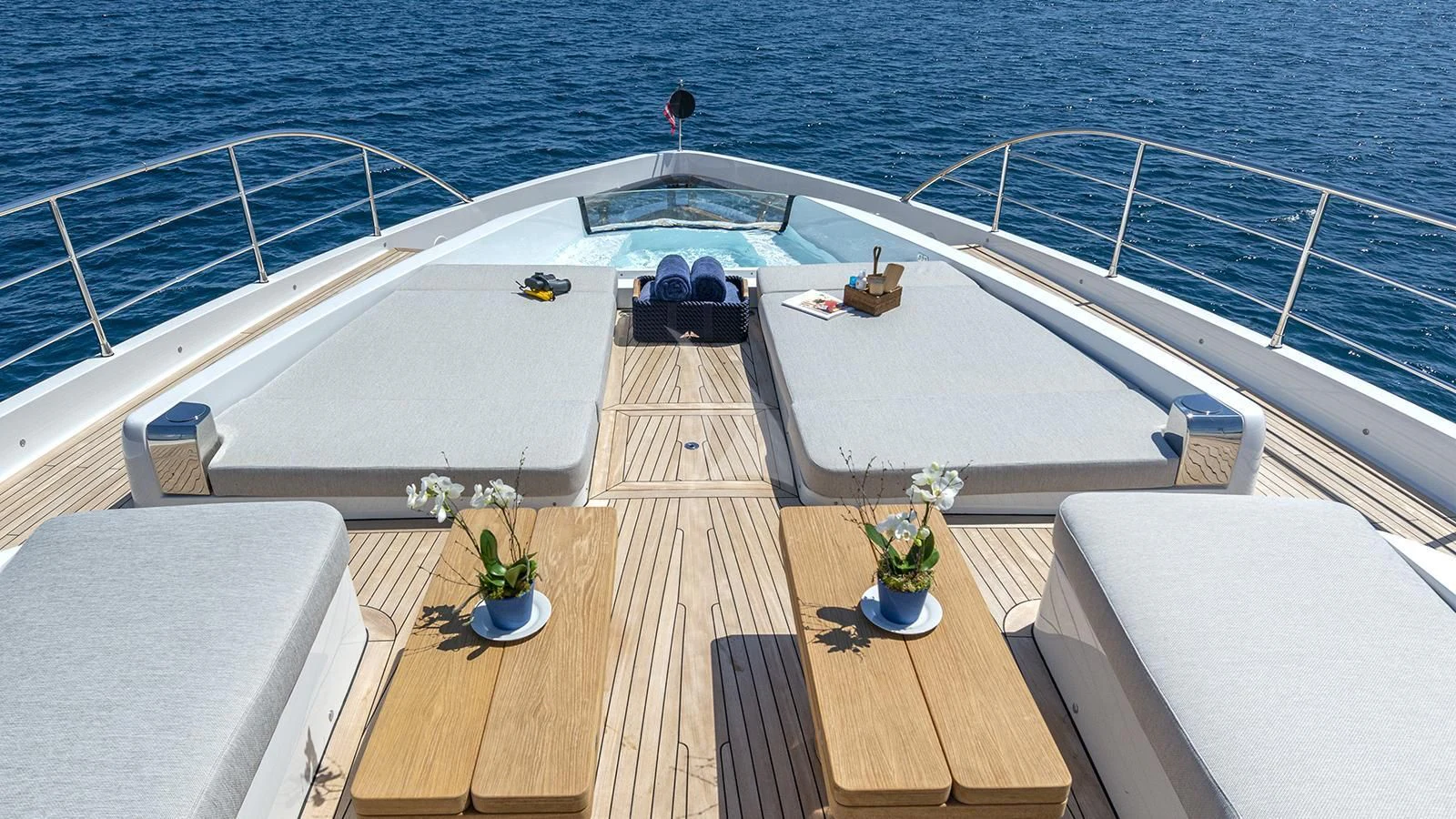 a deck with a large deck overlooking the ocean aboard ARSANA Yacht for Charter
