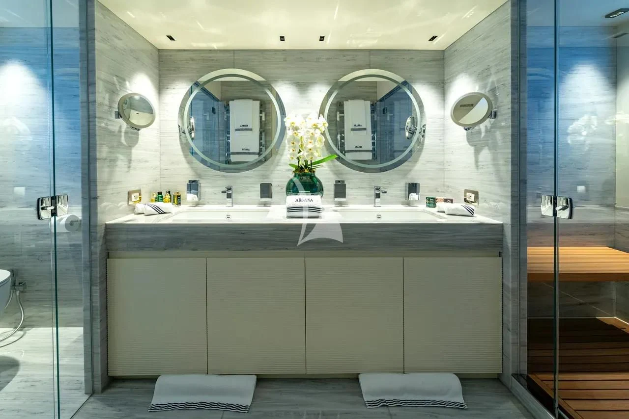 a bathroom with a large mirror aboard ARSANA Yacht for Charter