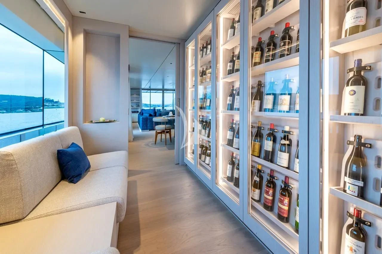 a room with shelves and bottles aboard ARSANA Yacht for Charter