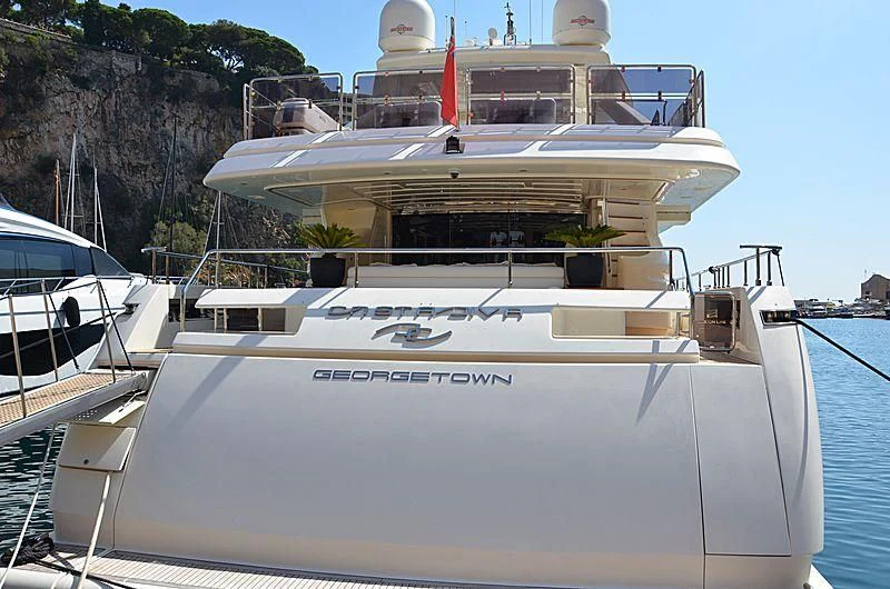 a white boat with a red stripe aboard CASTA DIVA Yacht for Sale