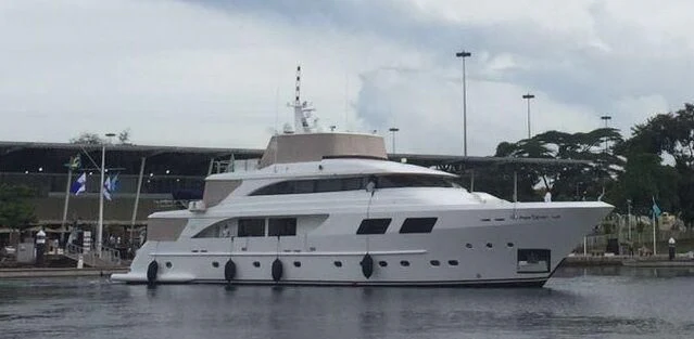a white boat in a body of water aboard PAPA-GOLFE Yacht for Sale