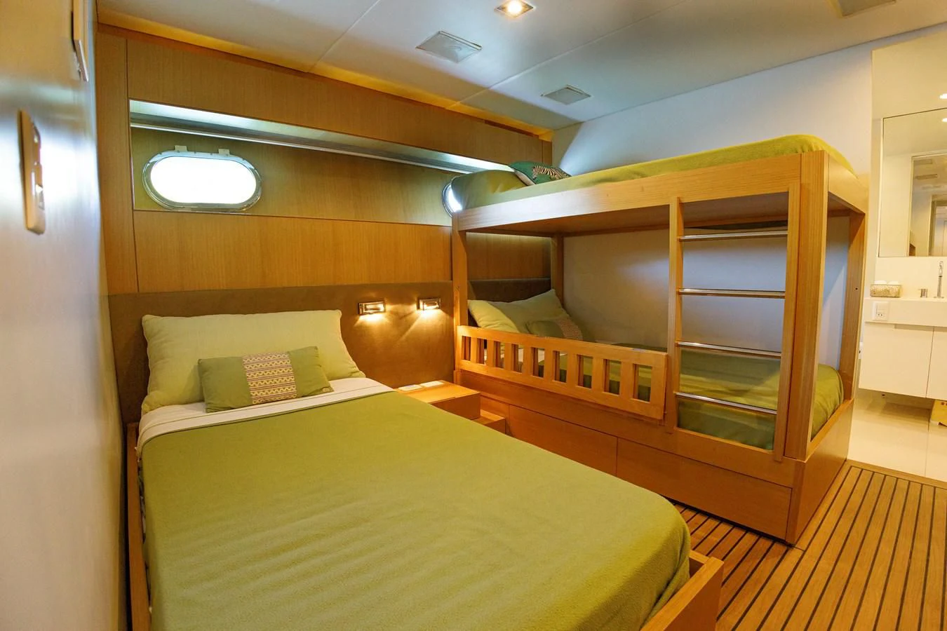 a room with a bed and a desk aboard PAPA-GOLFE Yacht for Sale