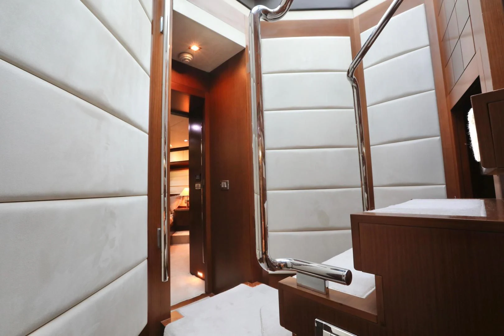 a staircase with white walls aboard ANDREIKA Yacht for Sale
