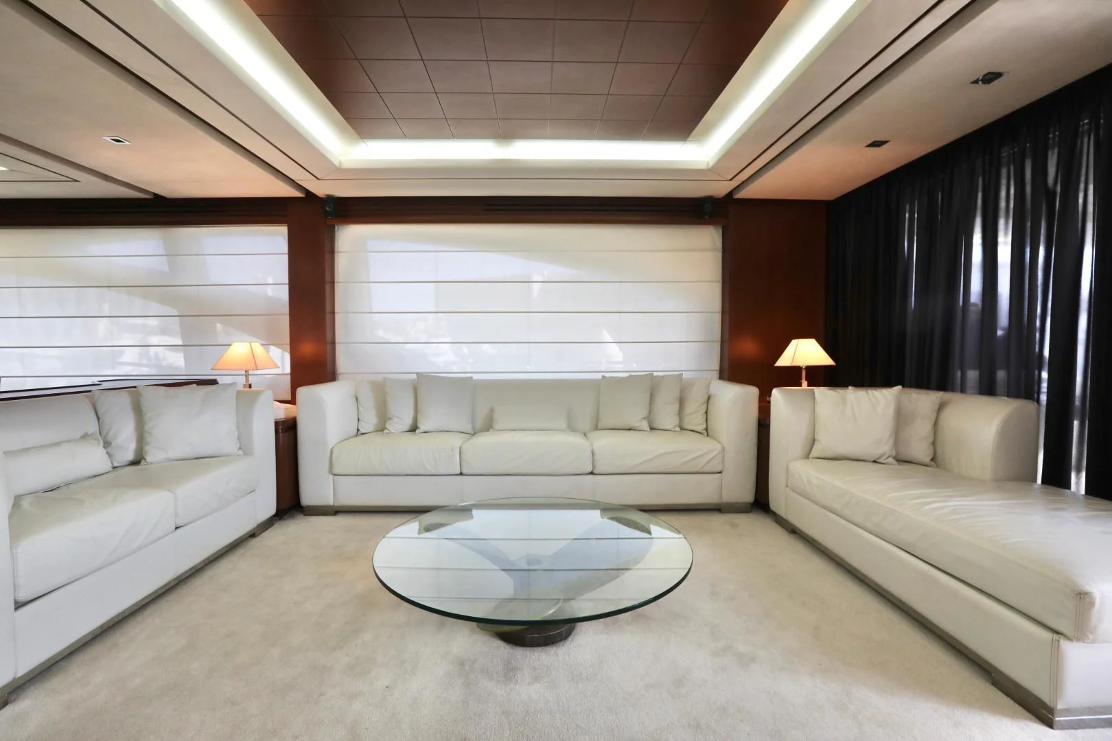 a living room with a couch and a table aboard ANDREIKA Yacht for Sale
