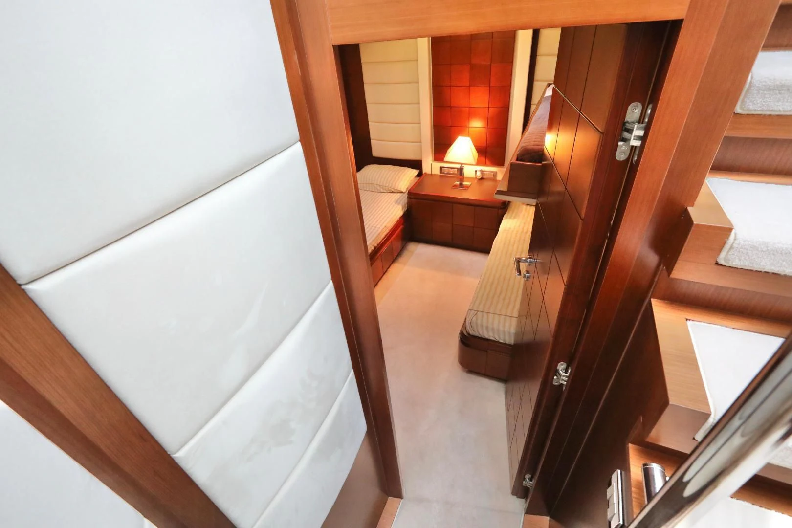 a room with a bed and a desk aboard ANDREIKA Yacht for Sale