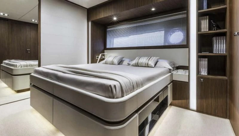 a bed in a room aboard OXIDANTE Yacht for Sale