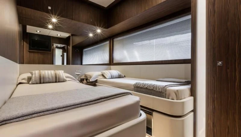a room with two beds aboard OXIDANTE Yacht for Sale