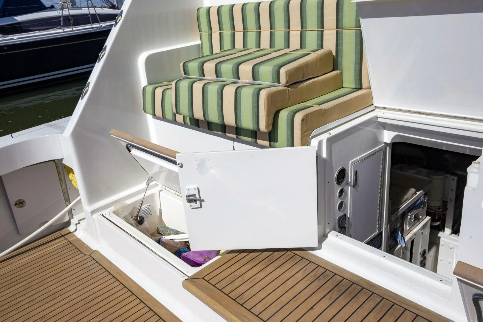 a room with a couch and a table aboard PRIME TIME Yacht for Sale