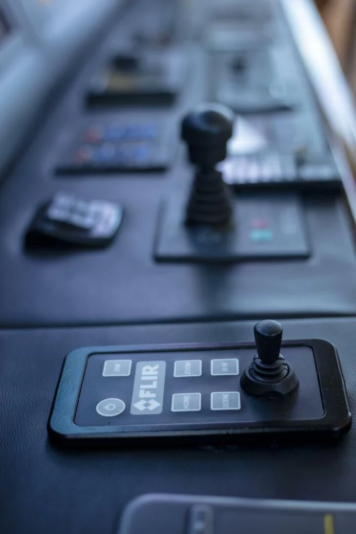 a close-up of a game controller aboard PRIME TIME Yacht for Sale