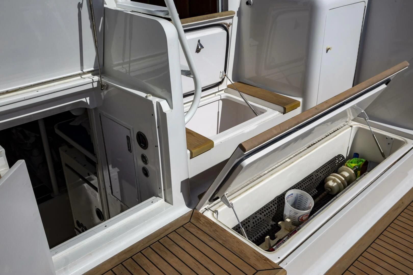 a kitchen with a sink and a laptop aboard PRIME TIME Yacht for Sale