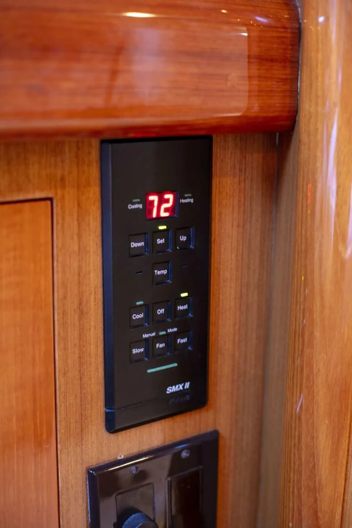 a black rectangular electronic device aboard PRIME TIME Yacht for Sale