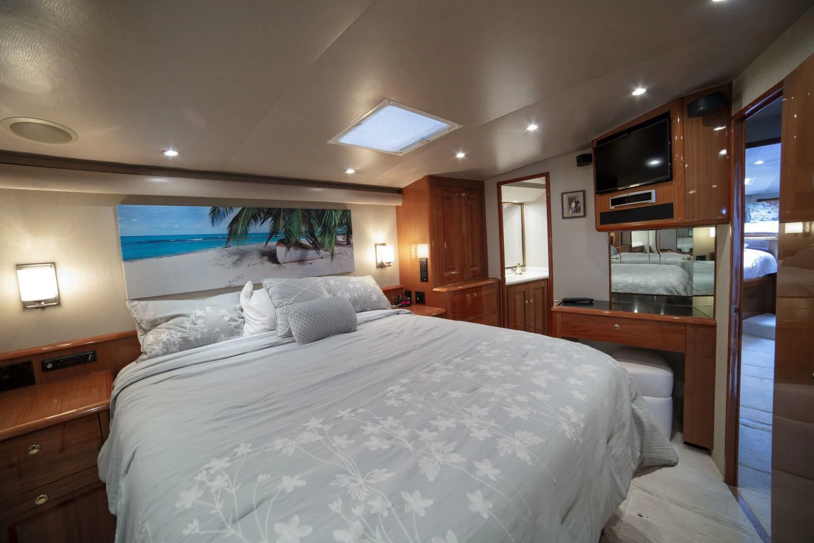 a large bed in a room aboard PRIME TIME Yacht for Sale