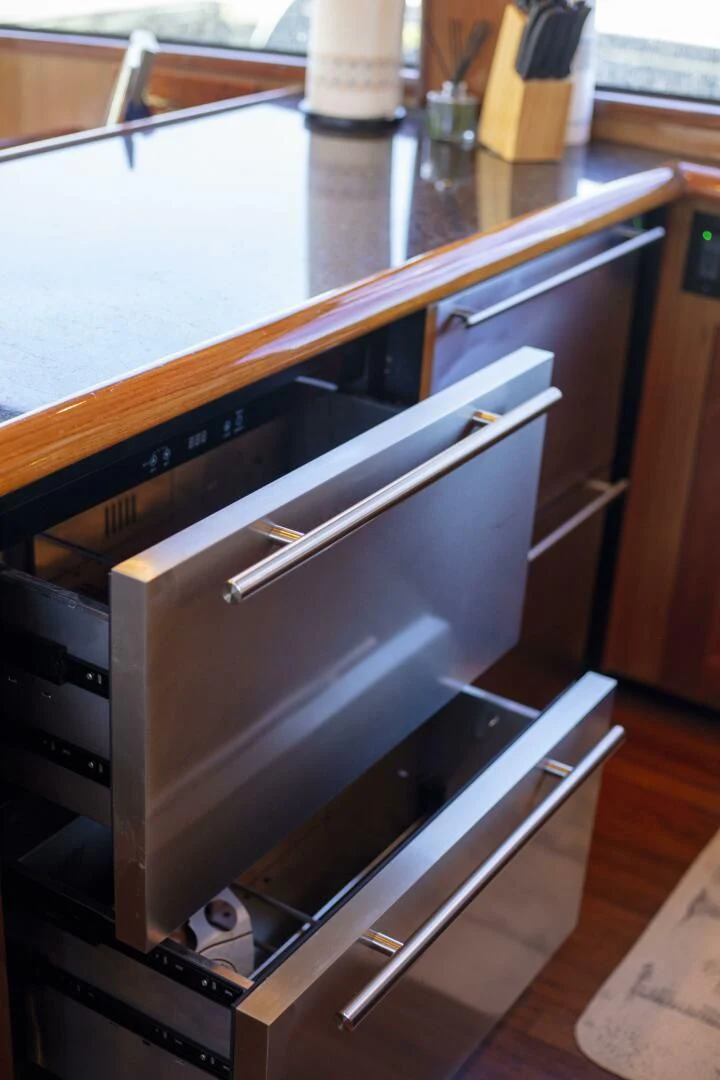 a metal cabinet with a drawer aboard PRIME TIME Yacht for Sale