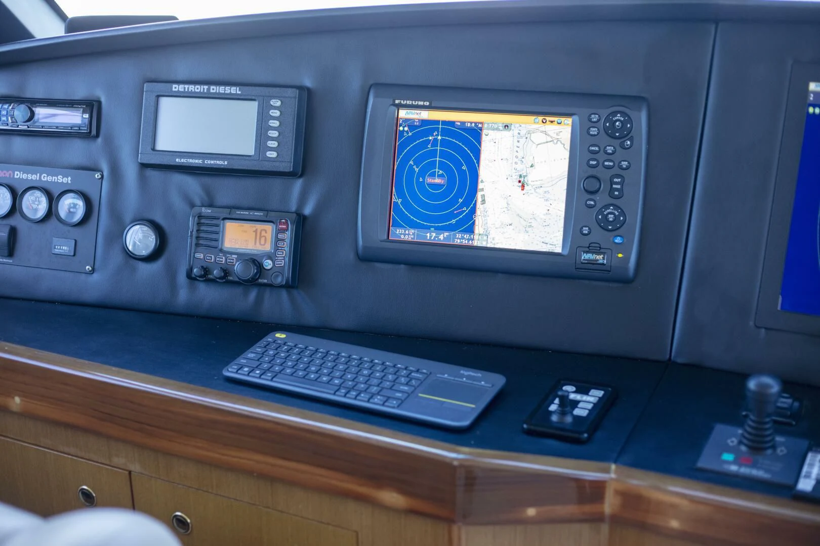 a computer with a keyboard and monitor aboard PRIME TIME Yacht for Sale