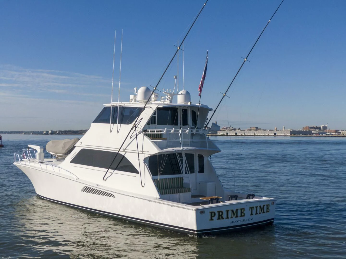 a white boat in the water aboard PRIME TIME Yacht for Sale