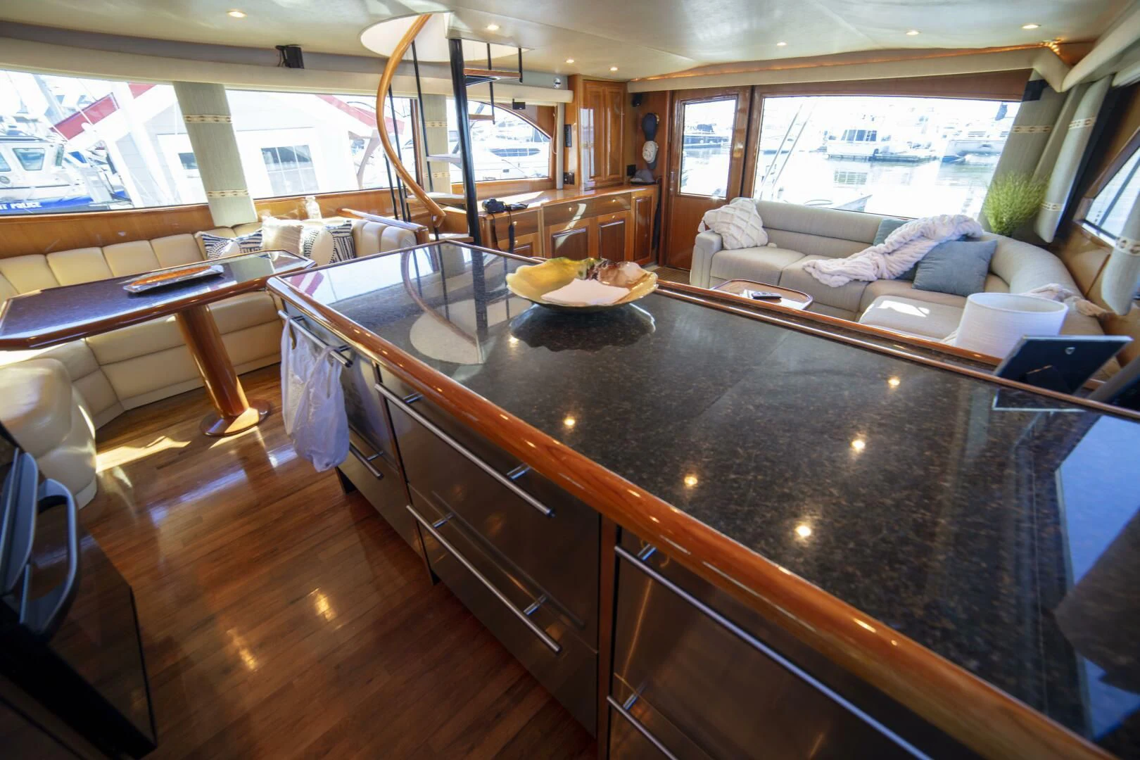 a kitchen with a large island aboard PRIME TIME Yacht for Sale