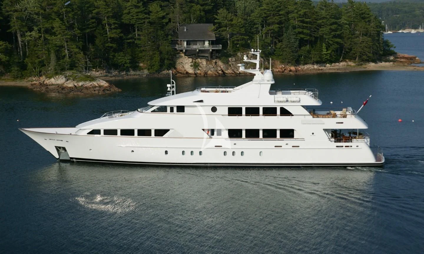 a white yacht on the water aboard ALTA Yacht for Sale