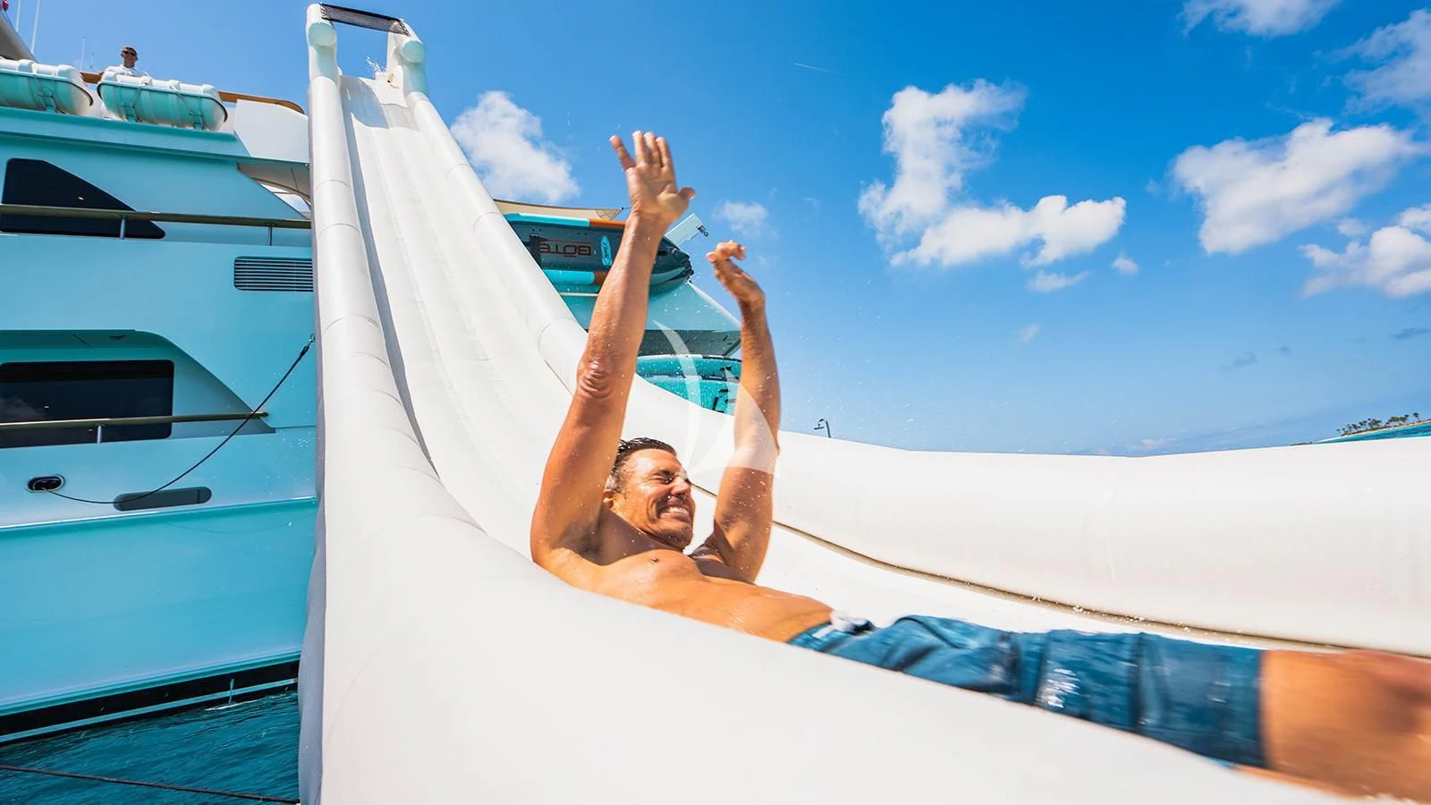 a person lying on a hammock on a boat aboard ALTA Yacht for Sale