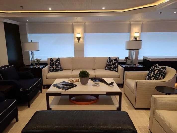 a living room with a large window aboard ALTA Yacht for Sale