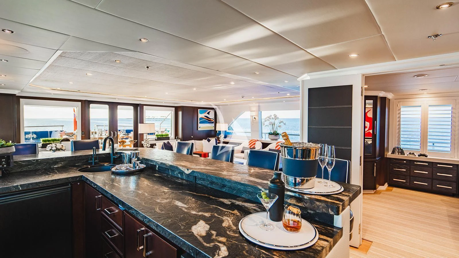 a kitchen with a large island aboard ALTA Yacht for Sale