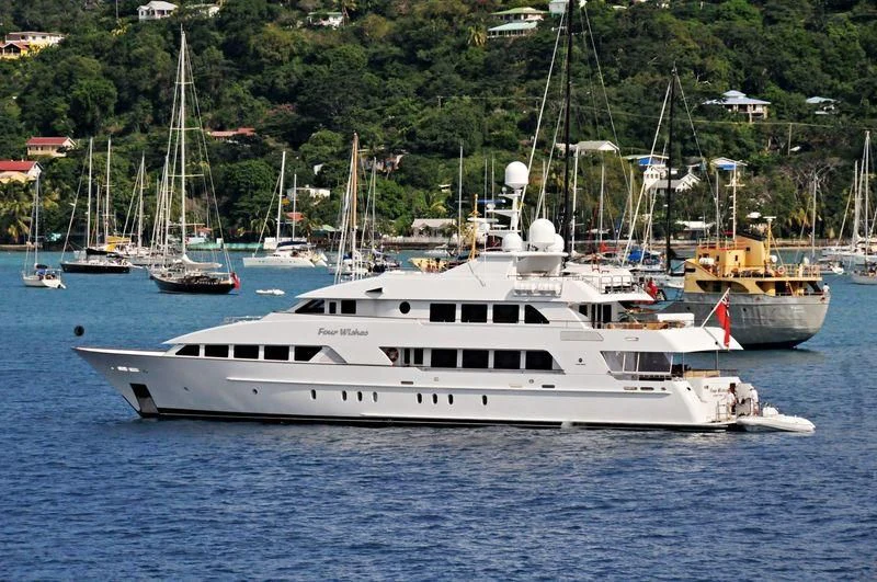 a white yacht in the water aboard ALTA Yacht for Sale