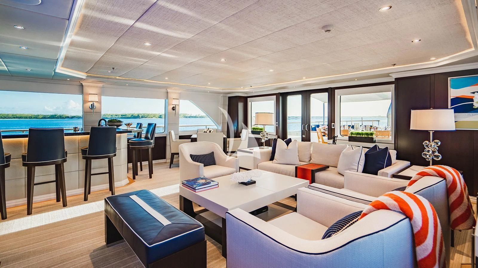 a living room with a table and chairs aboard ALTA Yacht for Sale