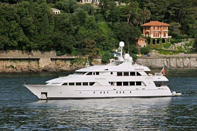 a white boat on water aboard ALTA Yacht for Sale