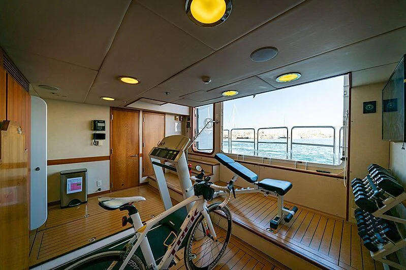 a room with many bikes parked on the floor aboard ALTA Yacht for Sale