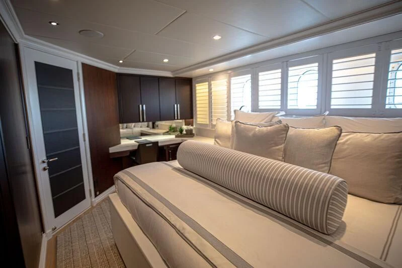 a bedroom with a bed aboard ALTA Yacht for Sale