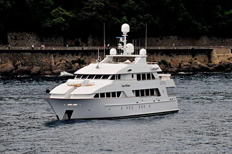 a white boat on water aboard ALTA Yacht for Sale