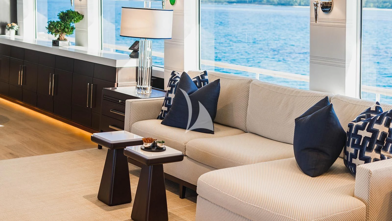 a living room with a couch and a table aboard ALTA Yacht for Sale