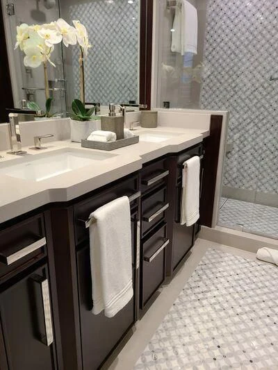 a bathroom with a sink and a mirror aboard ALTA Yacht for Sale