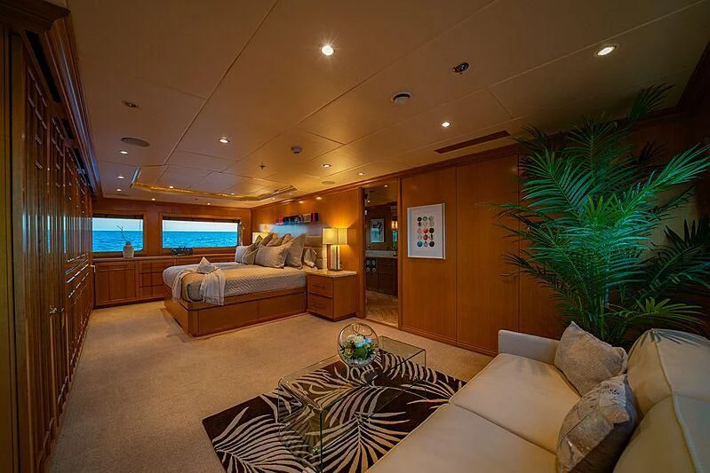 a living room with a couch and a tv aboard ALTA Yacht for Sale