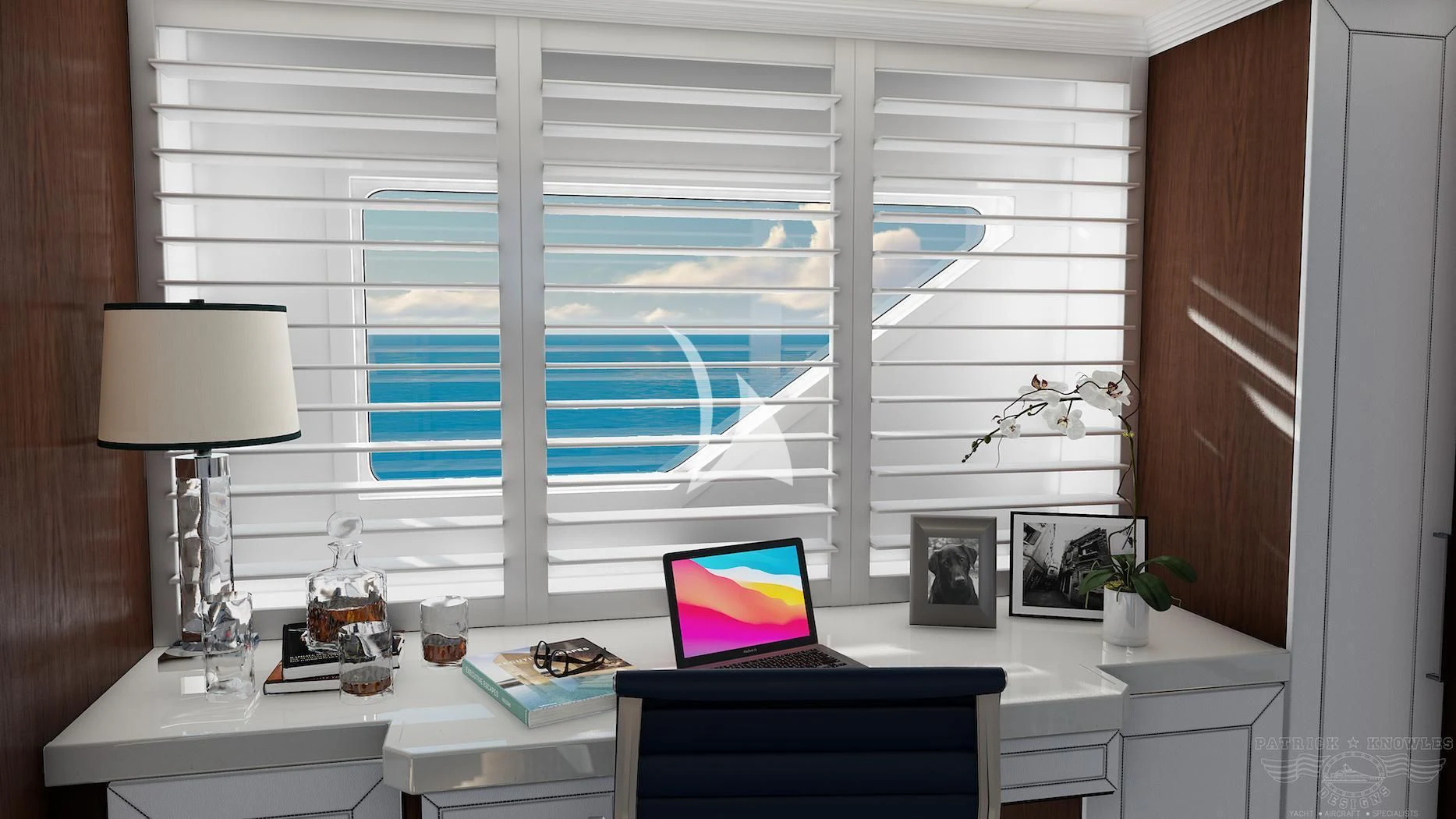 a laptop on a desk aboard ALTA Yacht for Sale