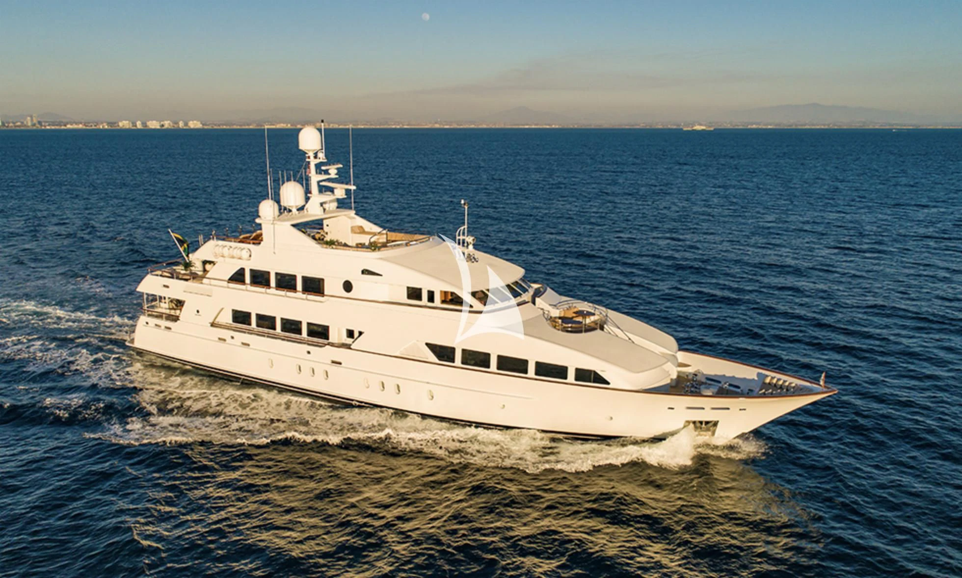 a white boat on the water aboard ALTA Yacht for Sale