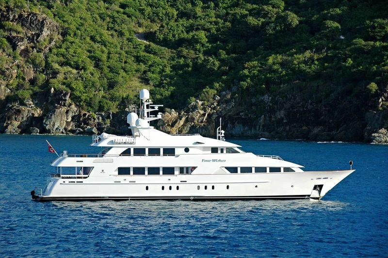 a white yacht on the water aboard ALTA Yacht for Sale