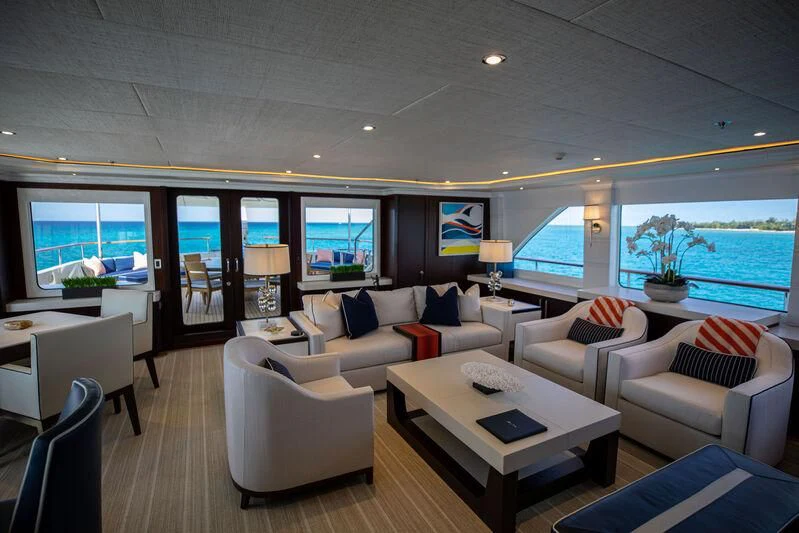 a living room with a large window aboard ALTA Yacht for Sale