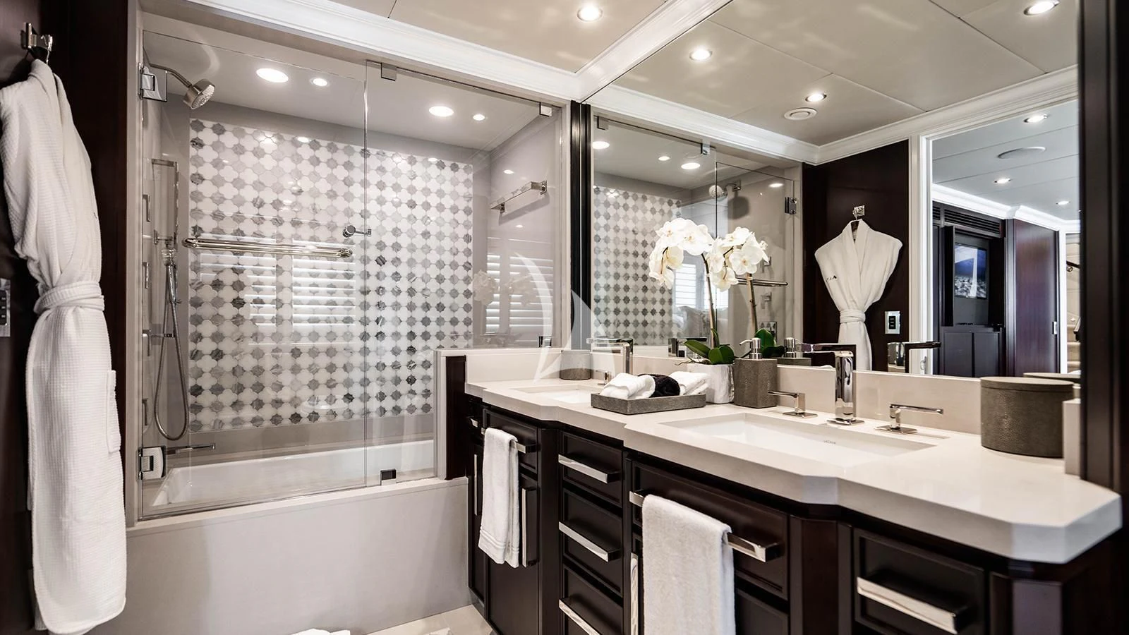 a bathroom with a large mirror aboard ALTA Yacht for Sale
