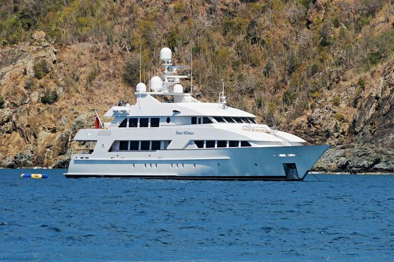 a white yacht in the water aboard ALTA Yacht for Sale