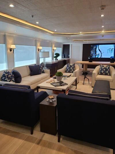 a living room with a large window aboard ALTA Yacht for Sale