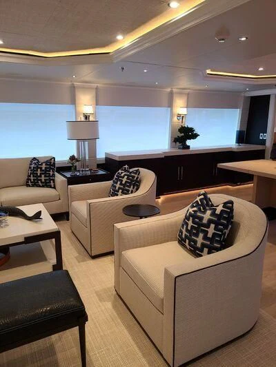 a living room with a large window aboard ALTA Yacht for Sale