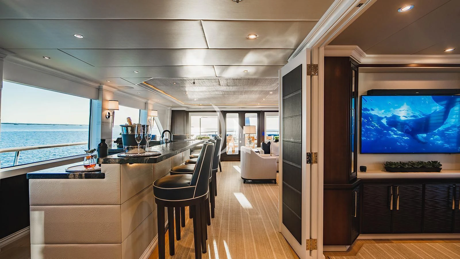 a room with a large tv aboard ALTA Yacht for Sale