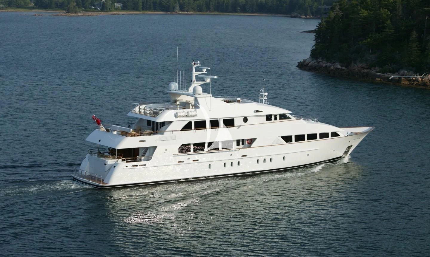 a white yacht on the water aboard ALTA Yacht for Sale