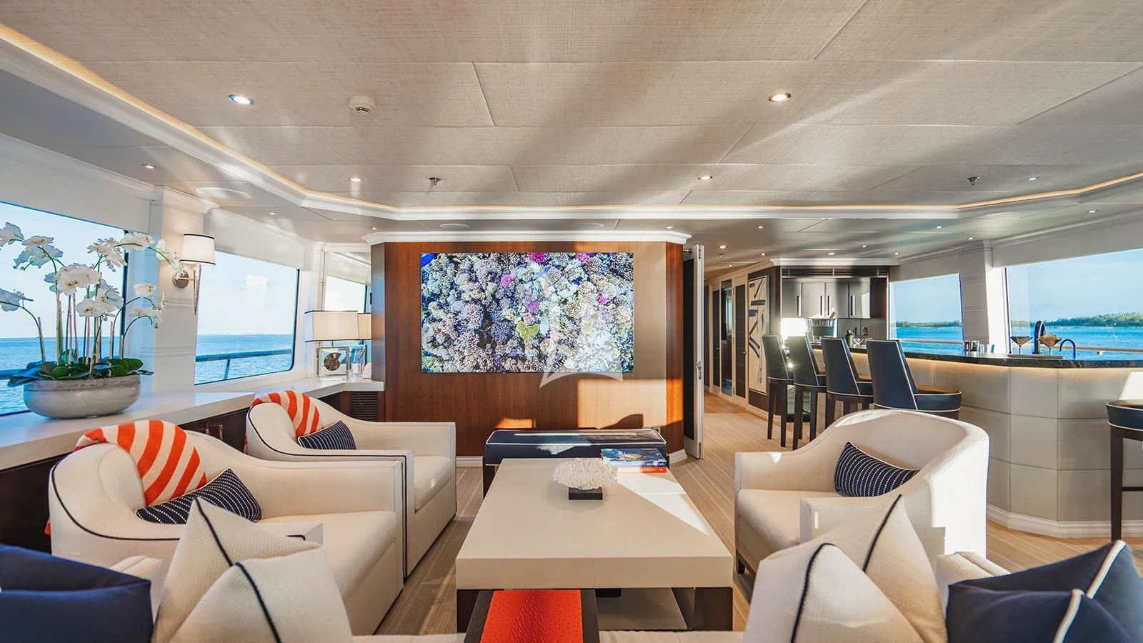 a room with a table chairs and a large window aboard ALTA Yacht for Sale