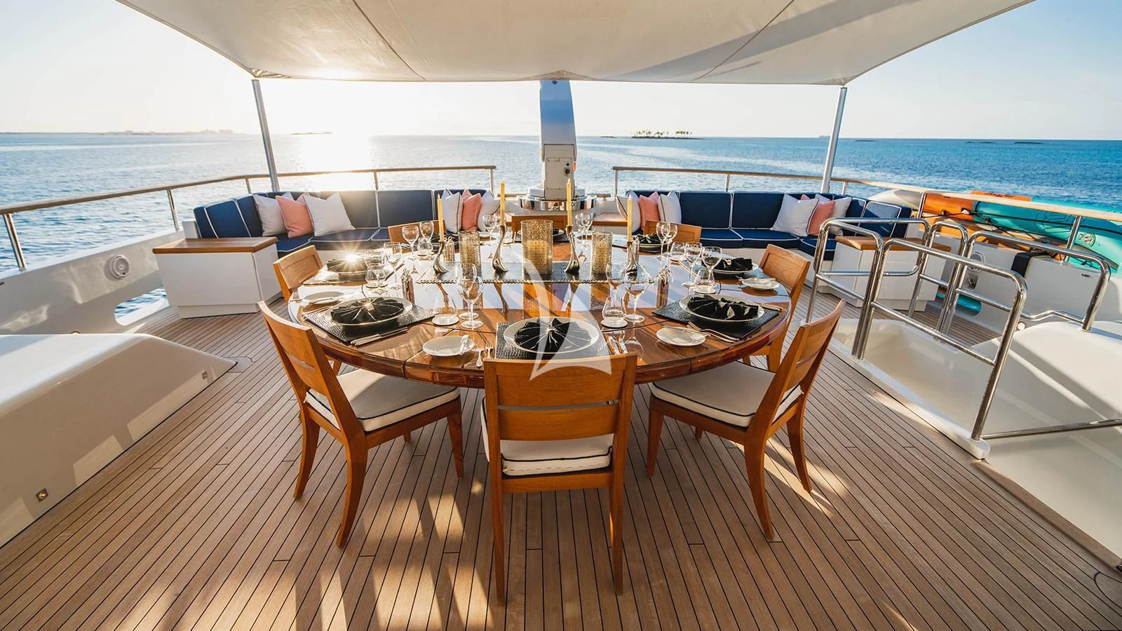 a table set for a meal on a boat aboard ALTA Yacht for Sale