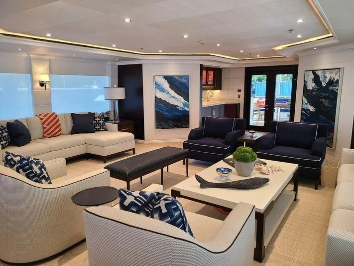 a living room with a large window aboard ALTA Yacht for Sale