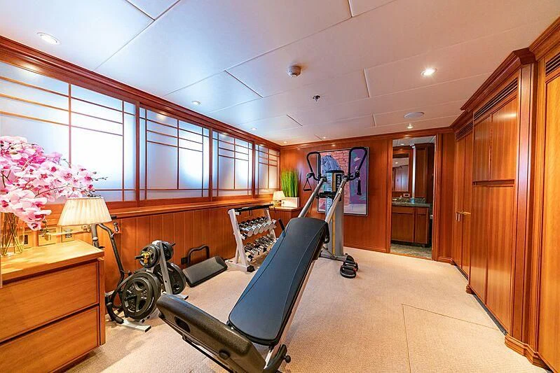 a room with a desk and a chair aboard ALTA Yacht for Sale